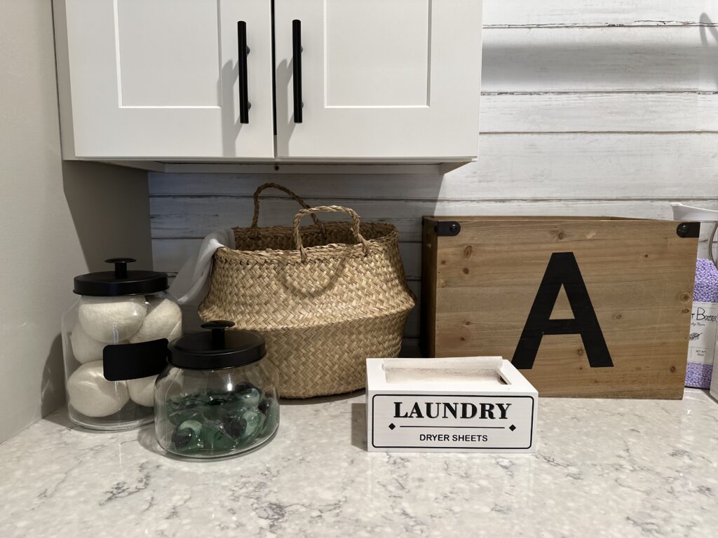 Farmhouse Laundry Decor: Dryer sheets, Glass jars, Basket and Wooden Bin