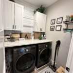 Farmhouse Laundry Room, white cabinets, wood and white accents