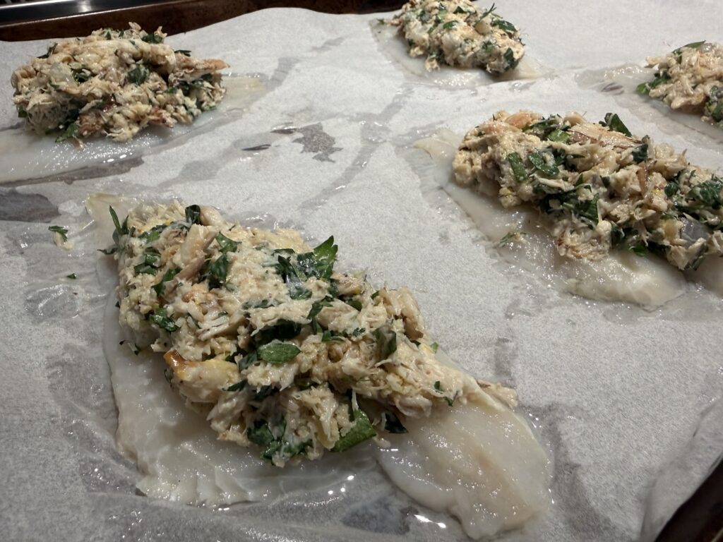 tuffed monkfish fillets topped with homemade crab and shrimp stuffing before baking. This easy seafood dinner features lump crab meat, fresh herbs, lemon, garlic, and buttery breadcrumbs.